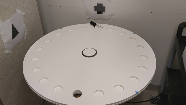 A Barnes maze with one hole (bottom of the image) that leads to an escape box